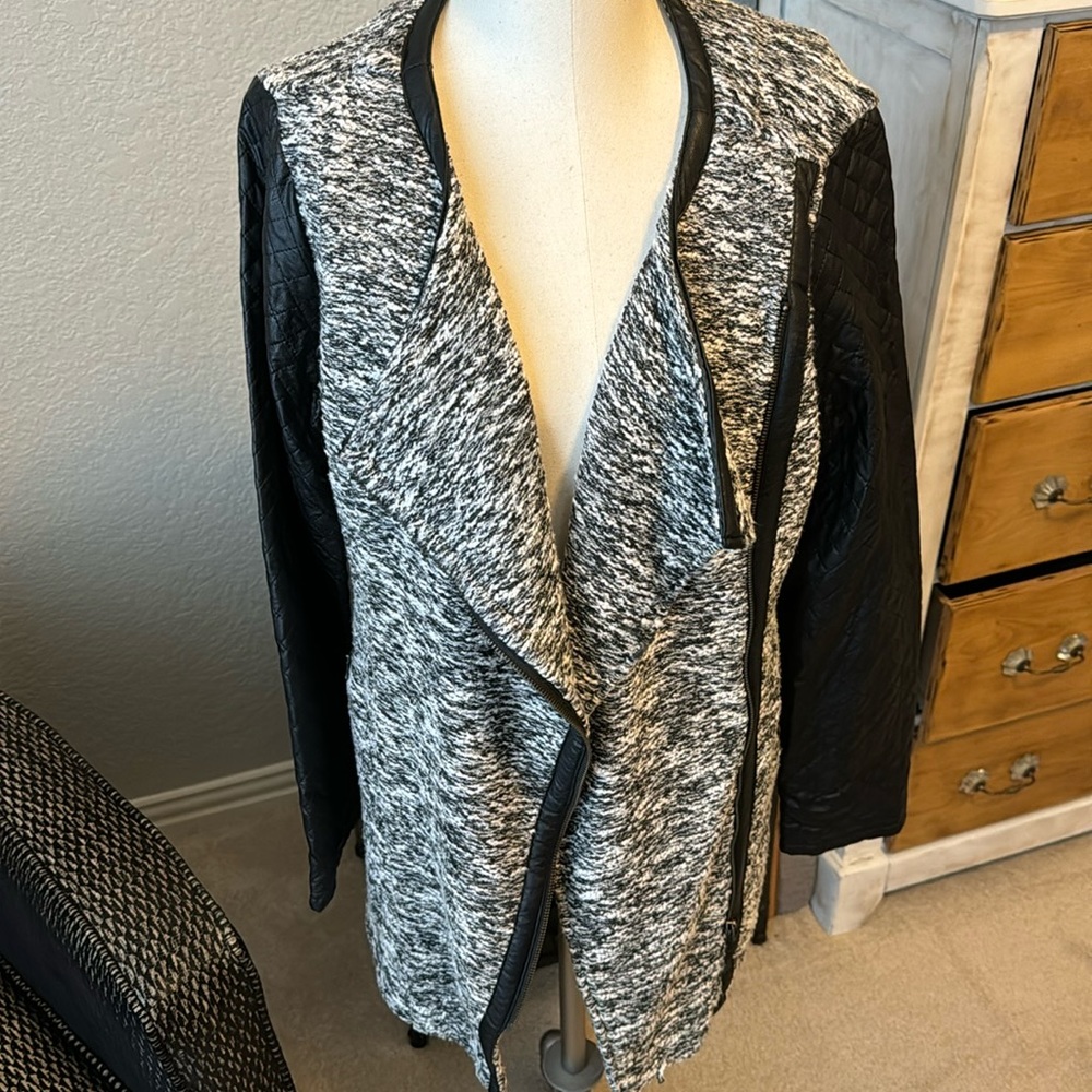 Anthropologie faux leather sleeve tween jacket.